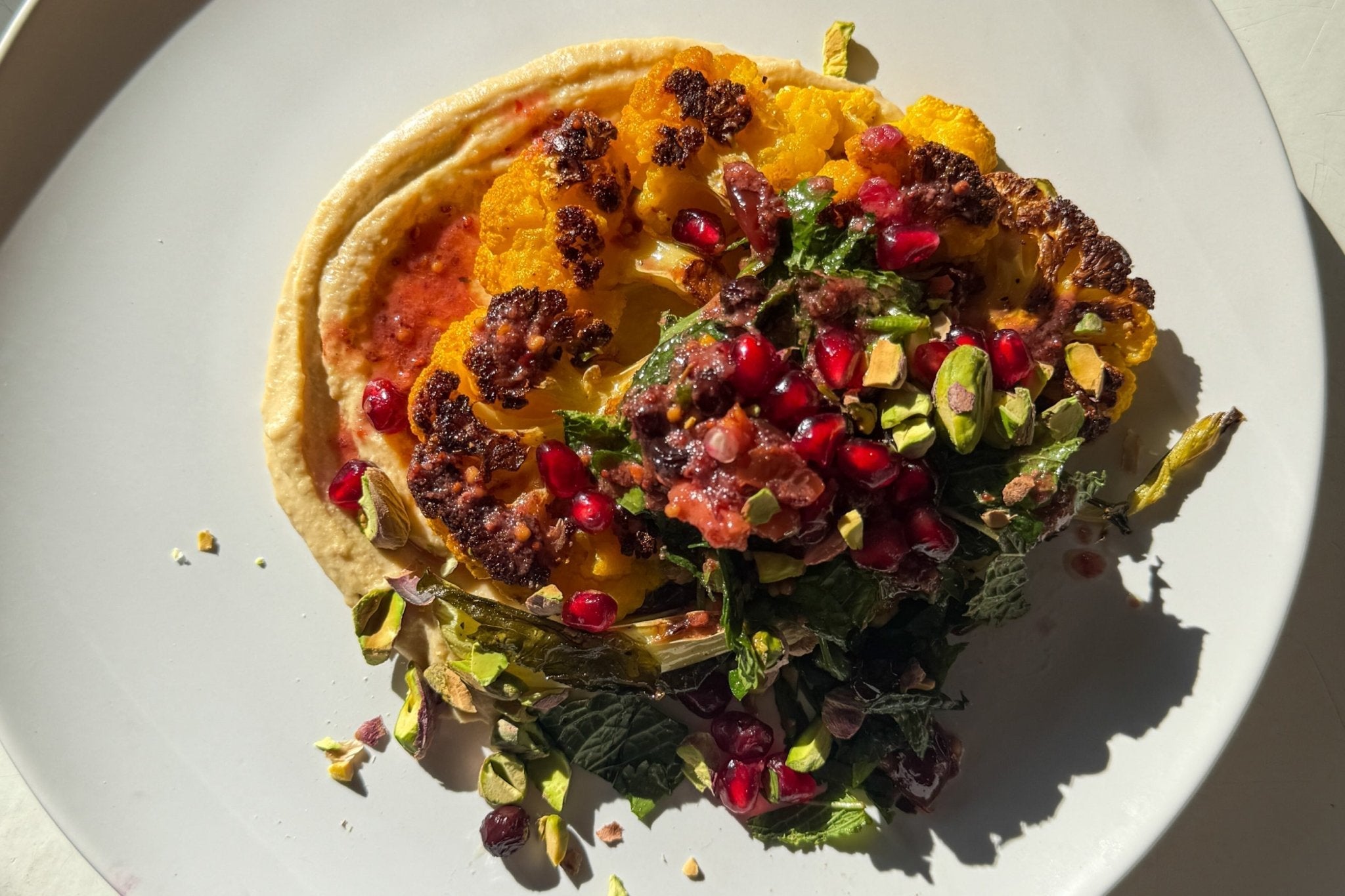Cauliflower Steaks with Golden Garlic Hummus